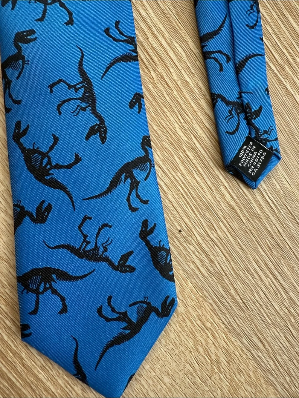 Wembley Blue Tie with Black Dinosaur Print